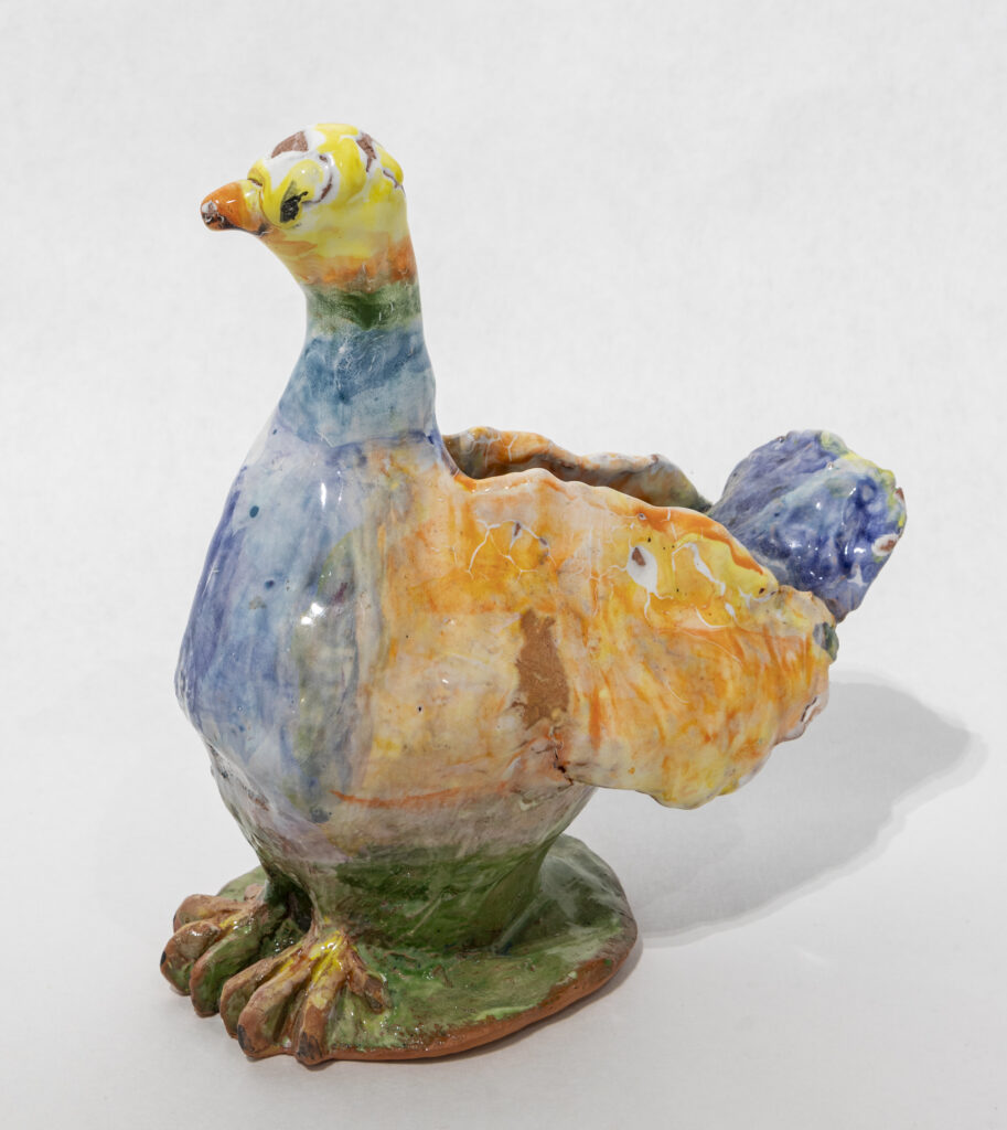 image of Susi Lulaki's - Yellow-headed Bird